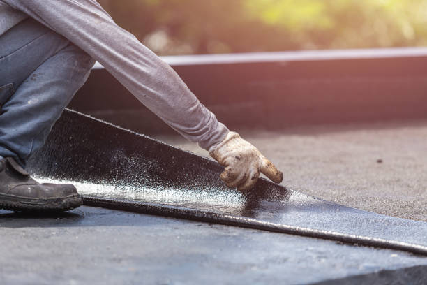 Professional Basement Waterproofing technician working in Summitville, IN